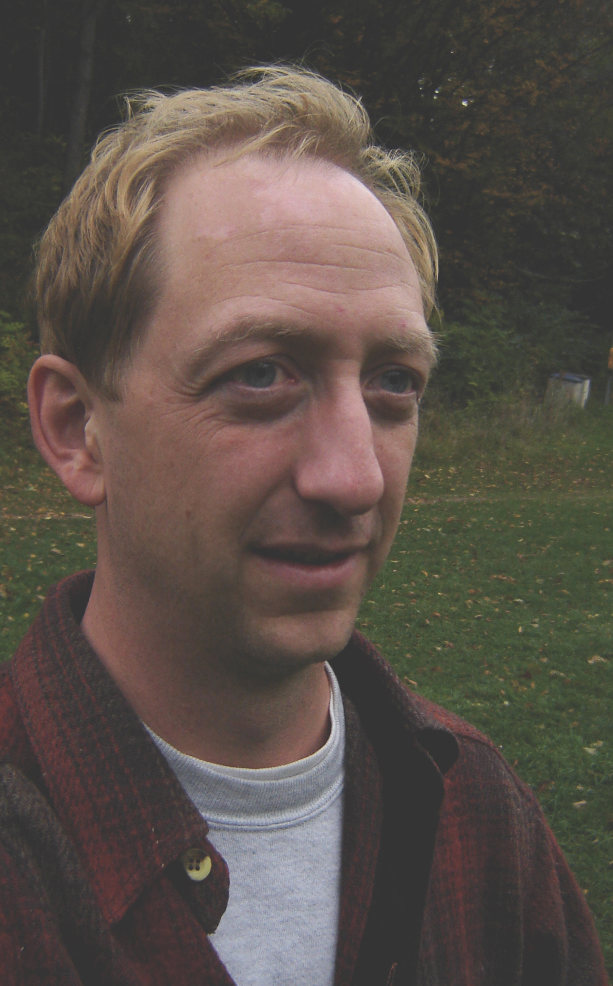 A book with bite Local author John Perry publishes debut tale for kids, "The Book That Eats People"